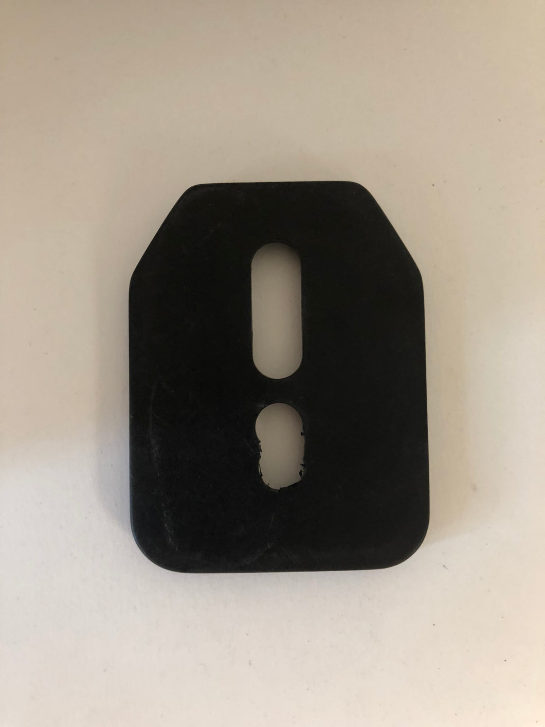 1rst gen. MTC jaw adapter plastic base plate under bolted under jaw.
