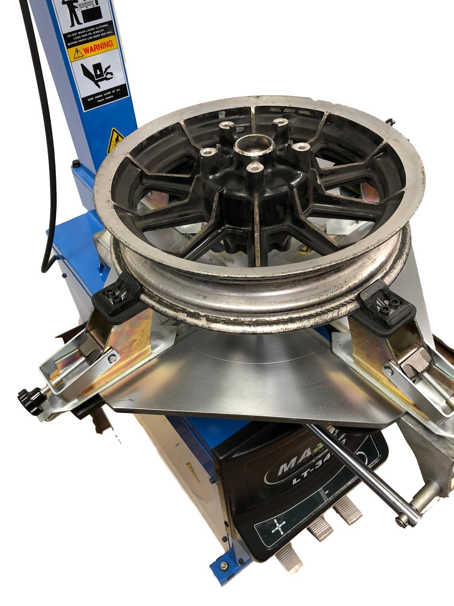Motorcycle tire removal store machine